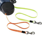 Furlouve Auto Double Dog Leash with orange and lime green retractable leads and built-in light.