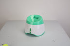 Furlouve automatic dog ball launcher, white and green ABS, with 3 distance settings and safety sensor.