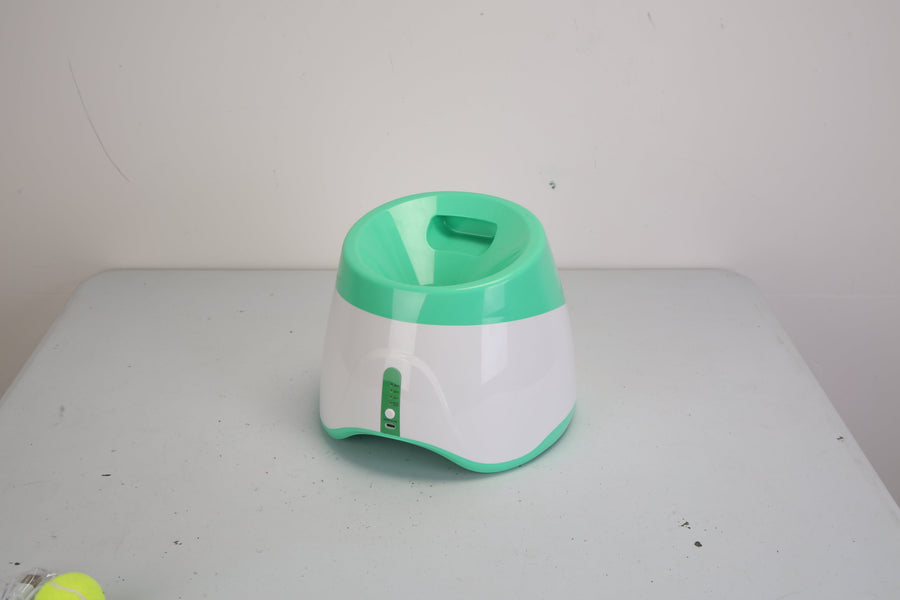 Furlouve automatic dog ball launcher, white and green ABS, with 3 distance settings and safety sensor.