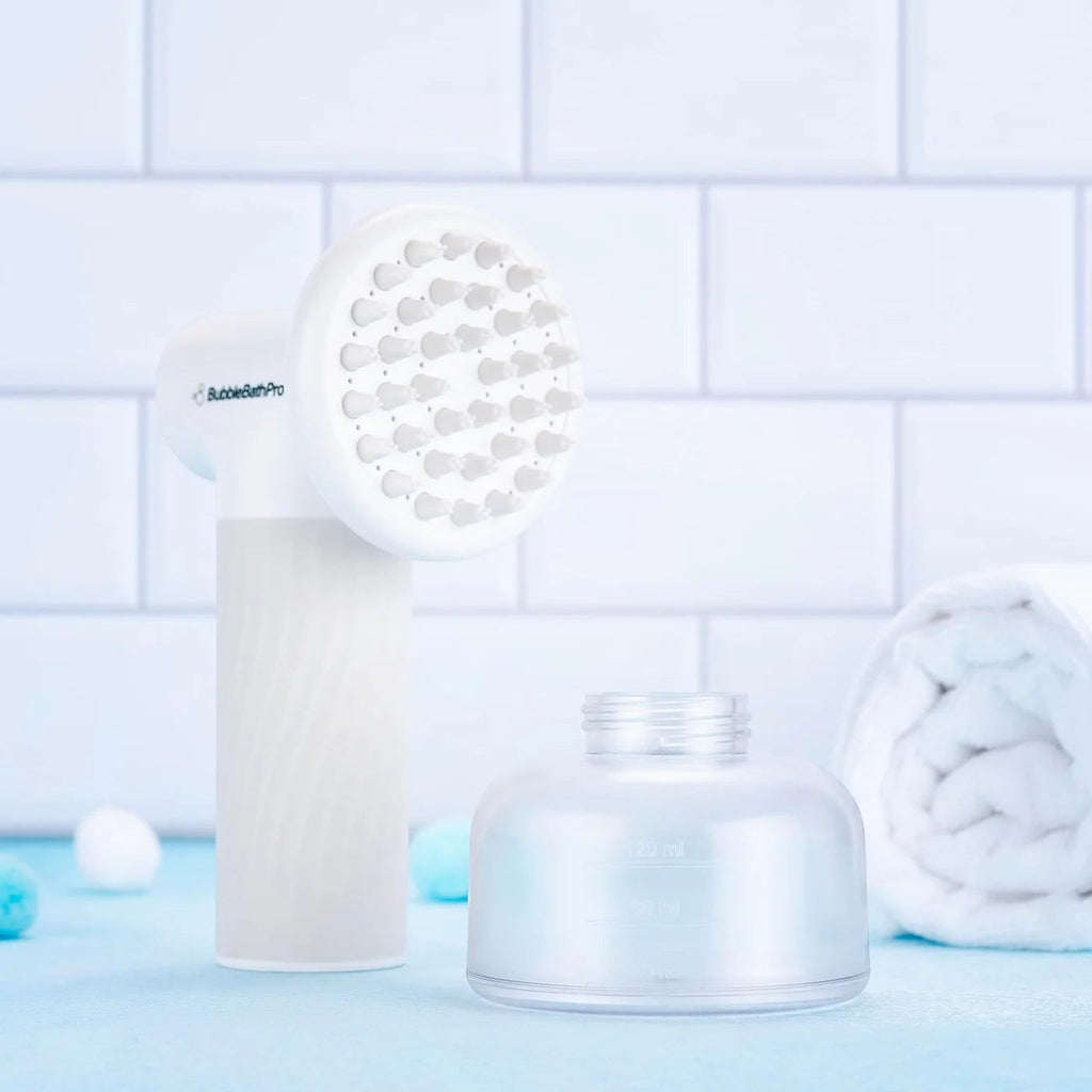 Furlouve white automatic foaming pet bath brush with soap dispenser and silicone bristles for dogs and cats.