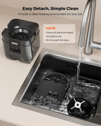 Furlouve black automatic pet feeder with timer and app control, shown next to a sink with water.