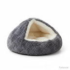 Furlouve grey plush hooded pet bed with cream interior, offering anti-anxiety comfort and cave-like snuggling.