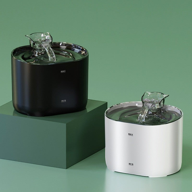Furlouve automatic cat water fountain in black and white, featuring circulating filtration for fresh, clean water and encouraging hydration.