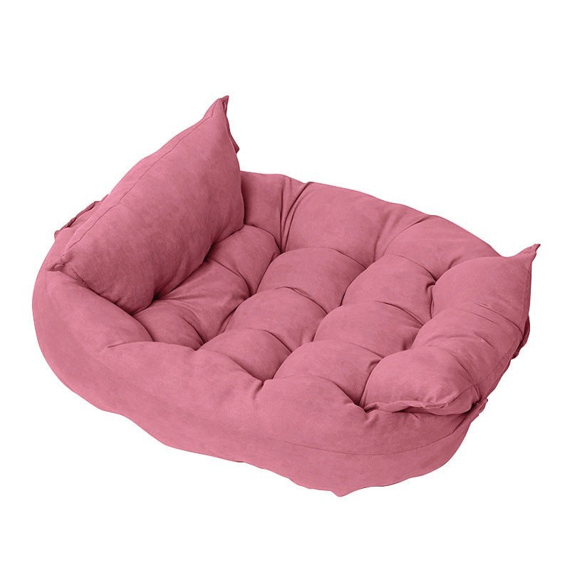 Furlouve plush pet cushion in rose pink, made of imitation deer skin velvet fabric, with a tufted design and raised edges.