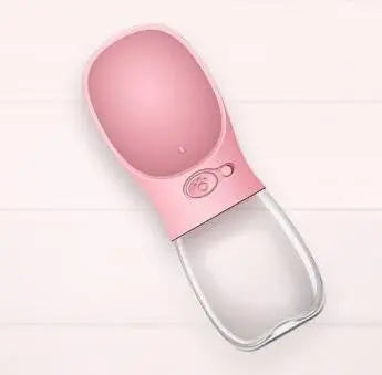 Furlouve pink portable pet water bottle with a built-in trough for easy dispensing and retracting water.
