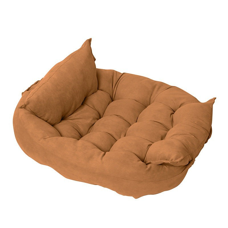 Furlouve plush pet cushion in caramel brown, made of imitation deer skin velvet fabric, with tufted interior and raised edges.