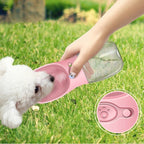 Furlouve pink portable pet water bottle with built-in trough, leak-proof design, and one-touch operation.