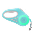 Furlouve mint green retractable dog leash with ergonomic handle and one-button brake. Features a glowing green light.
