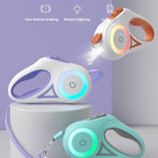 Furlouve retractable dog leash in mint green and purple with one-button brake and LED lighting. ABS housing.