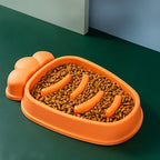 Furlouve orange PP slow feed dog bowl with anti-choke design, shaped like a carrot.