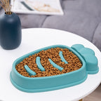 Furlouve teal PP slow feed dog bowl with anti-choke design, shaped like a carrot.